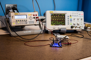 Mixed-signal oscilloscope display showing a counter output and stuck bit