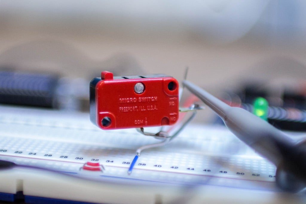 Red Microswitch on Breadboard with debounce library